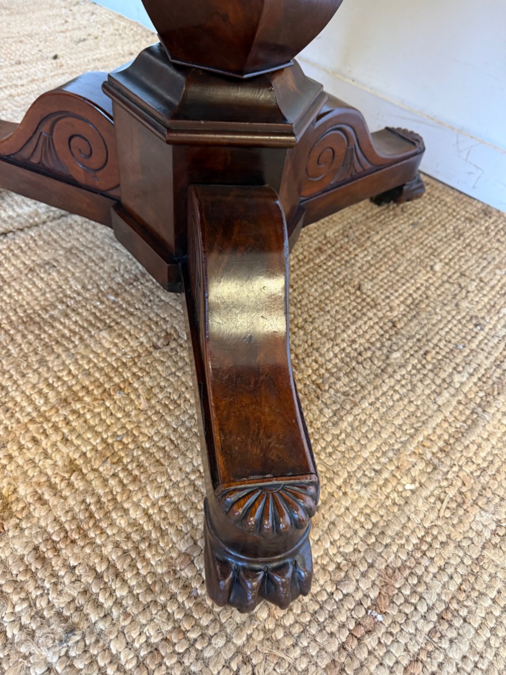 A 19th-century circular centre table featuring a white marble top set on a dark mahogany turned pedestal with a scroll-footed tripod base. View X