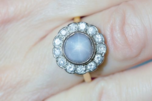 an early 20th centruy natural star sapphire and diamond dress ring - CATEGORY: ANTIQUE JEWELLERY - DATED EDWARDIAN