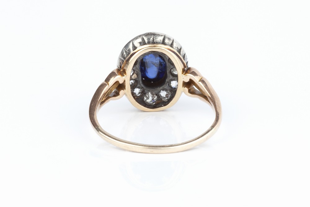 A Natural Unheated Cabochon Sapphire and Diamond Ring View III