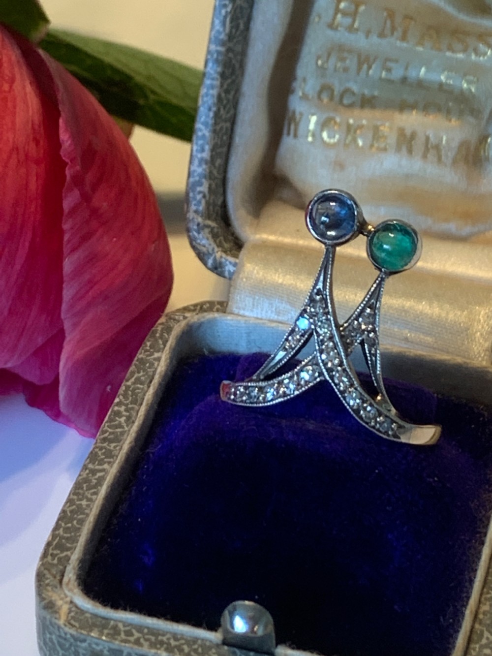 An Art Nouveau Sapphire Emerald and Diamond Ring