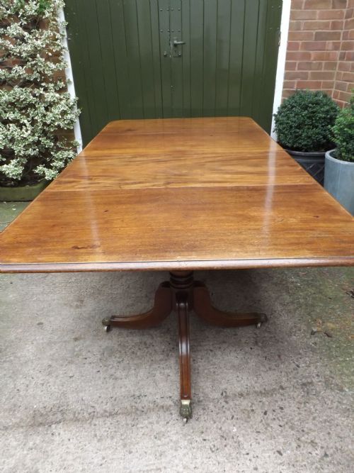 fig 1. Fine early C19th Regency period mahogany twin-pillar dining table.