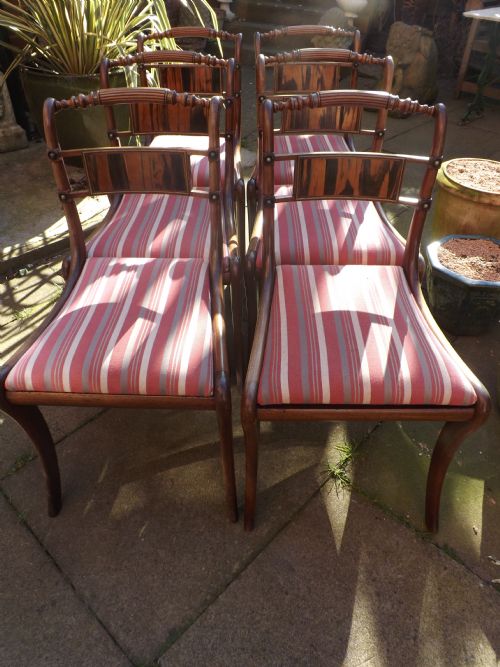 Set of 6 Early C19th Regency Period Mahogany and Coromandel Wood Sabre-leg Dining Chairs.