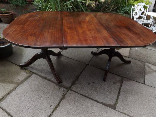 fig 2. Late C18th George III period mahogany twin-pillar dining table.