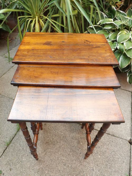 fig 1. Set of 3 C19th George IV period rosewood graduated nesting tables.