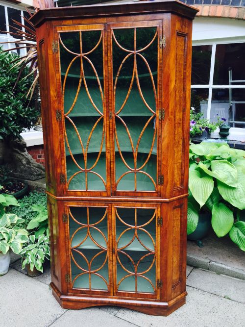 C19TH GEORGE I REVIVAL WALNUT DOUBLE CORNERCABINET WITH OVOID AND DIAMOND INTERLACED GLAZING - ADDITIONAL PHOTO 1