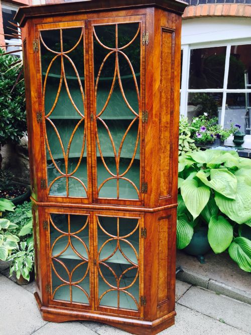 C19TH GEORGE I REVIVAL WALNUT DOUBLE CORNERCABINET WITH OVOID AND DIAMOND INTERLACED GLAZING - ADDITIONAL PHOTO 3