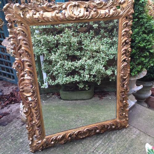 fig 1. Fine late C18th Italian Florentine carved gilt-wood frame mirror of good large scale.