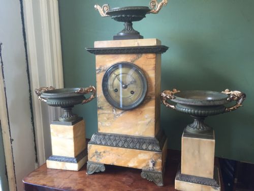 fig 1. Early C19th French Charles X period siena marble and patinated bronze clock garniture.