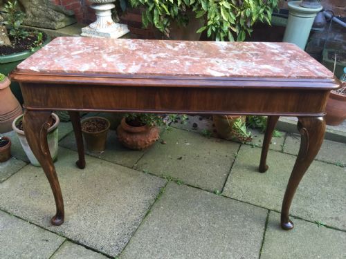 fig 1. Late C19th walnut console table with marble top in the early Georgian period revival style.