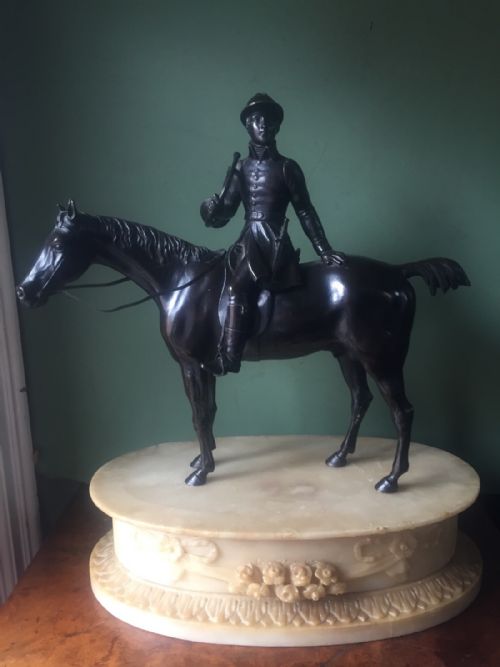 Fine Late C19th French Equestrian Bronze of a Mounted Huntsman on a Carved Ovoid Alabaster Plinth Base.