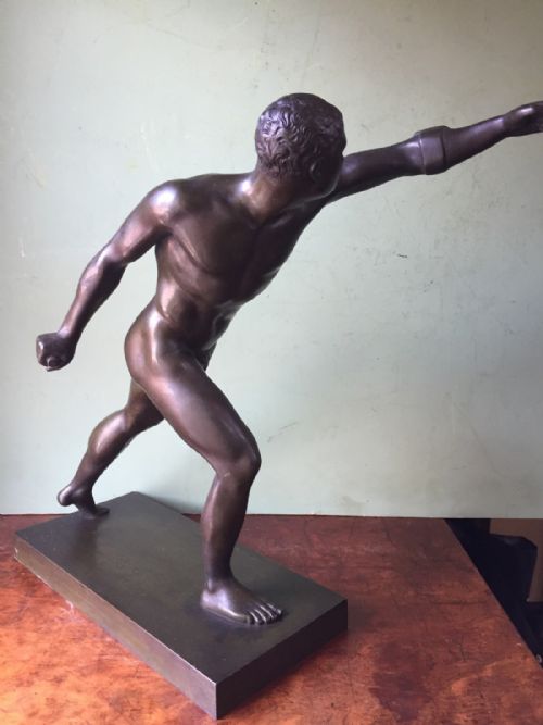 fig 2. A nineteenth-century dark brown patinated bronze study depicting the Borghese Gladiator posed dynamically on an integral rectangular base.