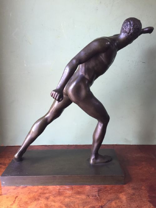 fig 3. A nineteenth-century dark brown patinated bronze study depicting the Borghese Gladiator posed dynamically on an integral rectangular base.