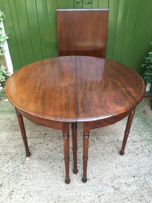 fig 3. Late C18th George III period mahogany d-ended dining table of highly adaptable format.