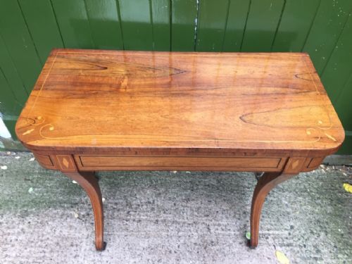 EARLY C19TH REGENCY PERIOD INLAID ROSEWOOD FOLDOVER CARD OR GAMING TABLE RAISED ON SABRE LEGS - ADDITIONAL PHOTO 1