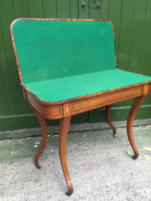 EARLY C19TH REGENCY PERIOD INLAID ROSEWOOD FOLDOVER CARD OR GAMING TABLE RAISED ON SABRE LEGS - ADDITIONAL PHOTO 3