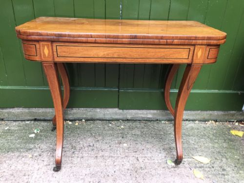 EARLY C19TH REGENCY PERIOD INLAID ROSEWOOD FOLDOVER CARD OR GAMING TABLE RAISED ON SABRE LEGS - ADDITIONAL PHOTO 13