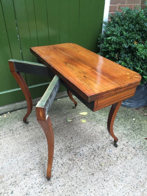 EARLY C19TH REGENCY PERIOD INLAID ROSEWOOD FOLDOVER CARD OR GAMING TABLE RAISED ON SABRE LEGS - ADDITIONAL PHOTO 5
