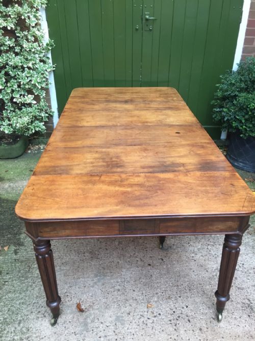 fig 6. Early C19th George IV period metamorphic mahogany extending dining table of Wilkinson patent type.