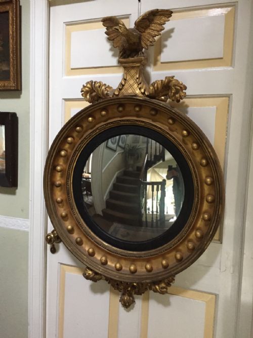 fig 1. Large early C19th Regency period carved gilt-wood framed convex plate mirror.
