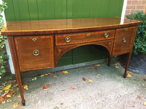 Late C19th /Early C20th Edwardian Period Inlaid Mahogany Bow-front Sideboard of Sheraton-revival Design .