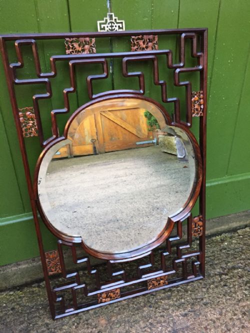 fig 1. Early C20th Chinese hardwood open fret-work framed wall mirror with carved boxwood decoration .