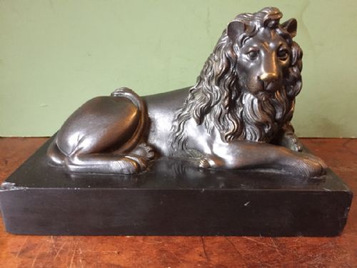 fig 1. Pair of mid-C19th French bronze lions on original black marble plinth bases.