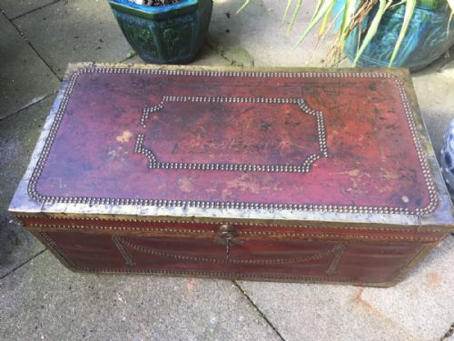 fig 1. Early C19th Chinese export brass-bound and studded burgundy leather-covered camphor trunk .