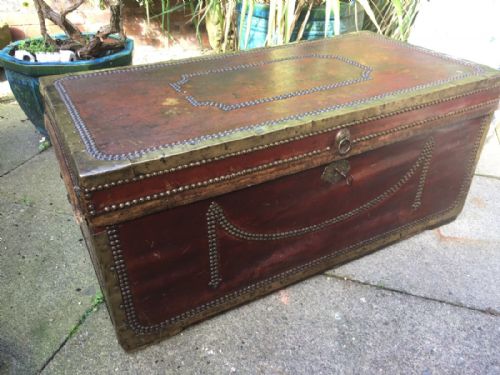 fig 2. Early C19th Chinese export brass-bound and studded burgundy leather-covered camphor trunk .