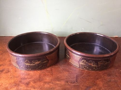 Pair of Early C19th Chinese Export Lacquer Wine-bottle Coasters.