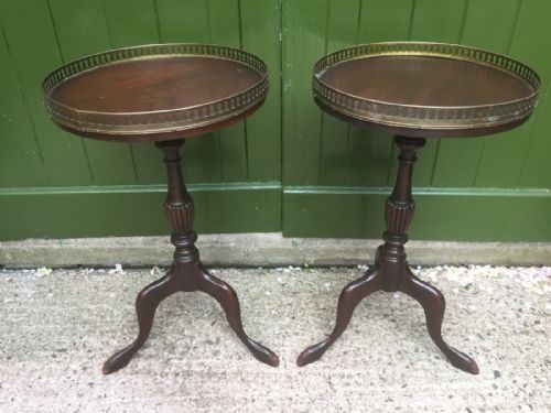 Pair of Early C20th Georgian Style Mahogany Tripod- Base Tables with Pierced Brass Gallery-edge Tops.