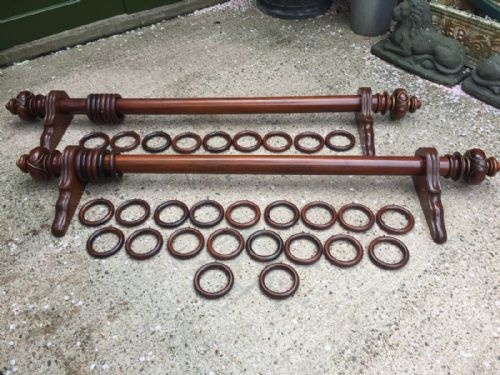 Pair of Impressive Mid C19th Mahogany and Parcel-gilt Curtain-poles with Rings and Brackets.