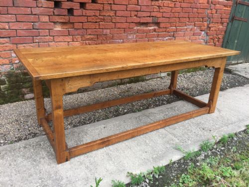 fig 1. Early C20th 'golden' oak table in the the manner of the Cotswold School .