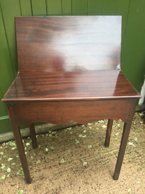 fig 1. Mid C18th George II period mahogany fold-over tea or side table of diminutive proportions.