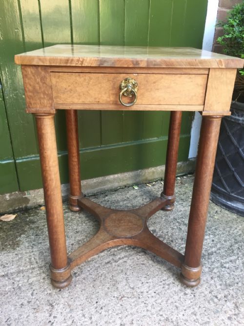 fig 1. Early C19th figured mahogany table of Empire design with a pleasing faded patina.