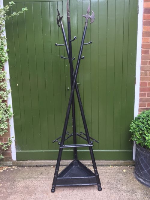 UNUSUAL AND DECORATIVE LATE C19TH FRENCH EBONISED HAT COAT AND STICKSTAND FORMED AS 3 CROSSED HALBERDS OR PIKES - ADDITIONAL PHOTO 2