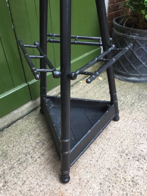 UNUSUAL AND DECORATIVE LATE C19TH FRENCH EBONISED HAT COAT AND STICKSTAND FORMED AS 3 CROSSED HALBERDS OR PIKES - ADDITIONAL PHOTO 7