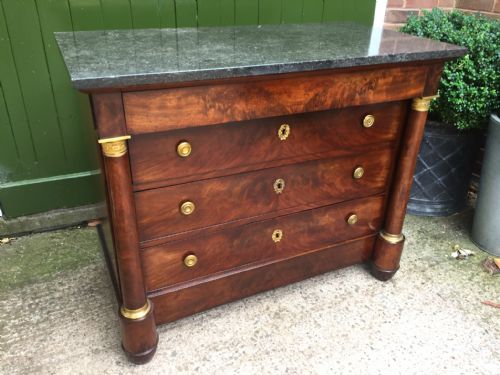 fig 4. Fine quality early C19th French Empire ormolu-mounted mahogany commode with fossilised Belgian marble top.