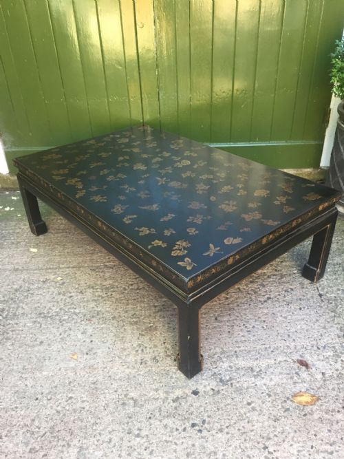 Early C20th Chinoiserie Style Black and Gold Lacquered Low Coffee Table.