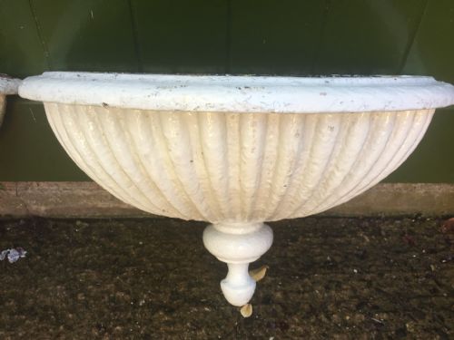 fig 1. Pair of early C19th cast-iron semi-circular wall-hanging planters of rare form.