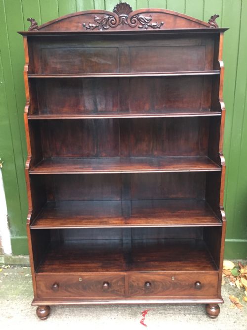 fig 1. Early C19th George IV period mahogany open bookcase of graduated 'waterfall ' design.