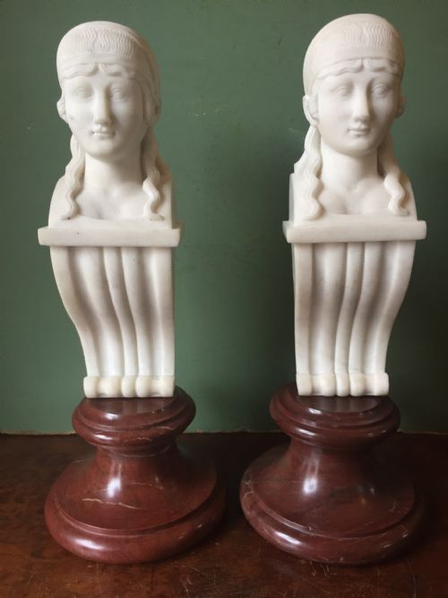 fig 1. Pair of early C19th Regency period carved statuary marble female term figures in the manner of Thomas Hope, mounted upon rouge marble socles.
