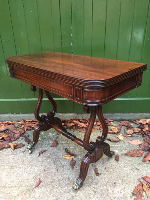 Early C19th Regency Period Mahogany Fold-over Top Tea-table on 'Lyre' End Supports.