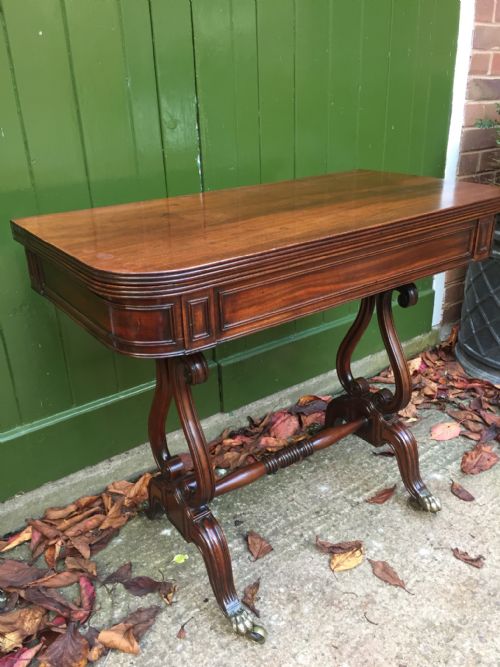 fig 3. Early C19th Regency period mahogany fold-over top tea-table on 'lyre' end supports.