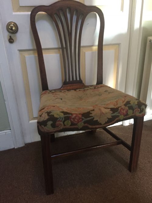 fig 1. Pair of C18th George III period mahogany side chairs with original needle-work seat covers .