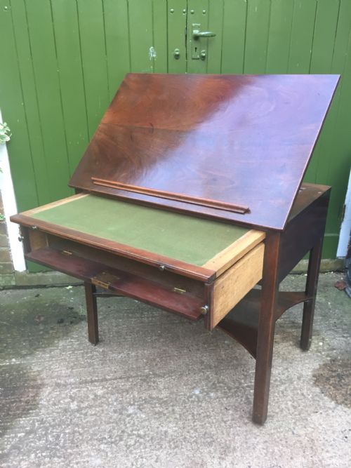 fig 3. Fine mid C18th George II period mahogany architect's or draughtsman’s table of metamorphic design.