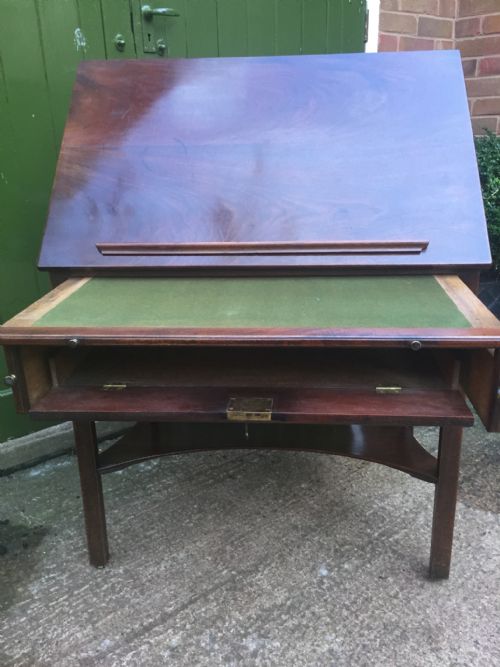 fig 4. Fine mid C18th George II period mahogany architect's or draughtsman’s table of metamorphic design.