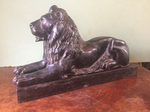 Late C19th Cast-iron Model of a Recumbent Lion on a Rectangular Plinth Base.