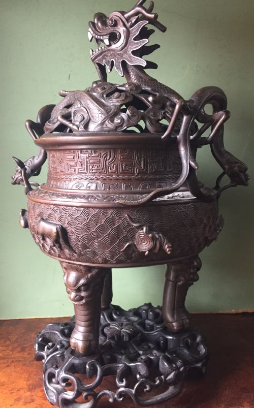 fig 1. C19th Chinese Qing Dynasty cast bronze 'dragon' censer , or incense burner , and cover on original carved hardwood stand .