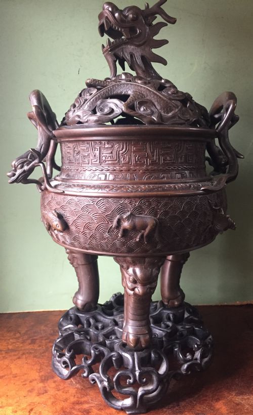 fig 2. C19th Chinese Qing Dynasty cast bronze 'dragon' censer , or incense burner , and cover on original carved hardwood stand .