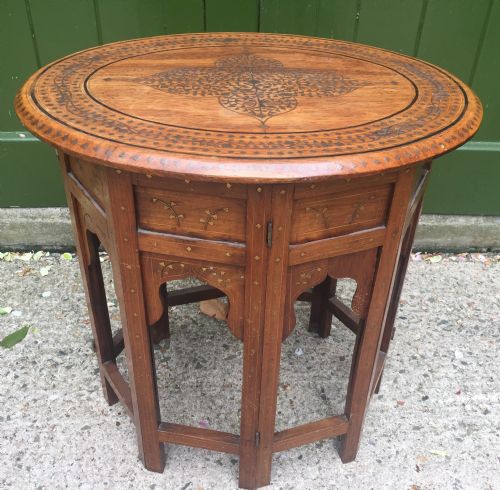 Late C19th Indian Brass-inlaid Oval Teak Occasional Table on Folding Arcaded Base.